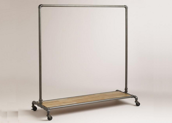 Flooring Standing Store Apparel Display Stands , Movable Clothes Rack On Wheels supplier